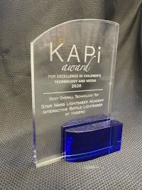a blue award with the word kapi on it